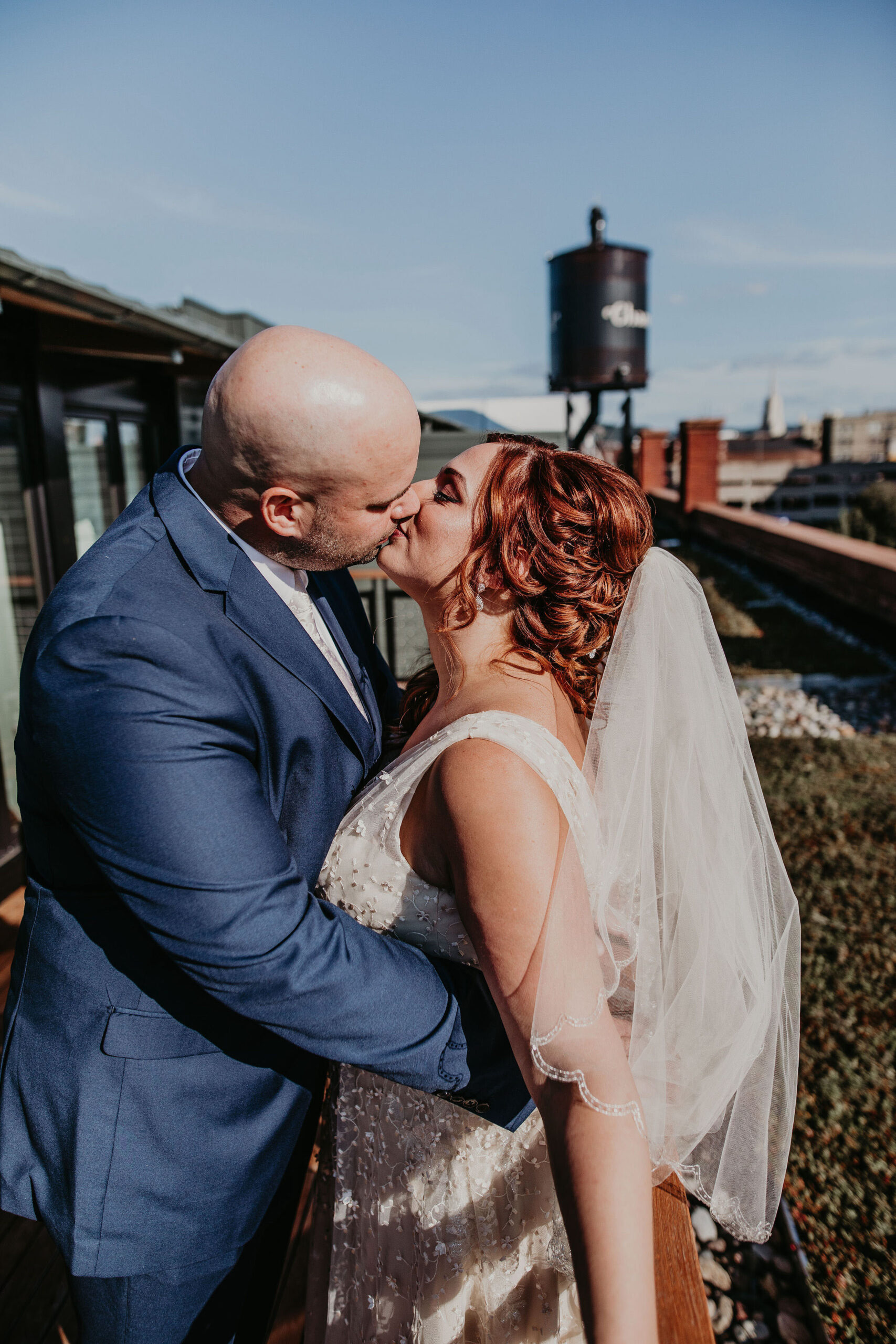 Bride and groom kissing