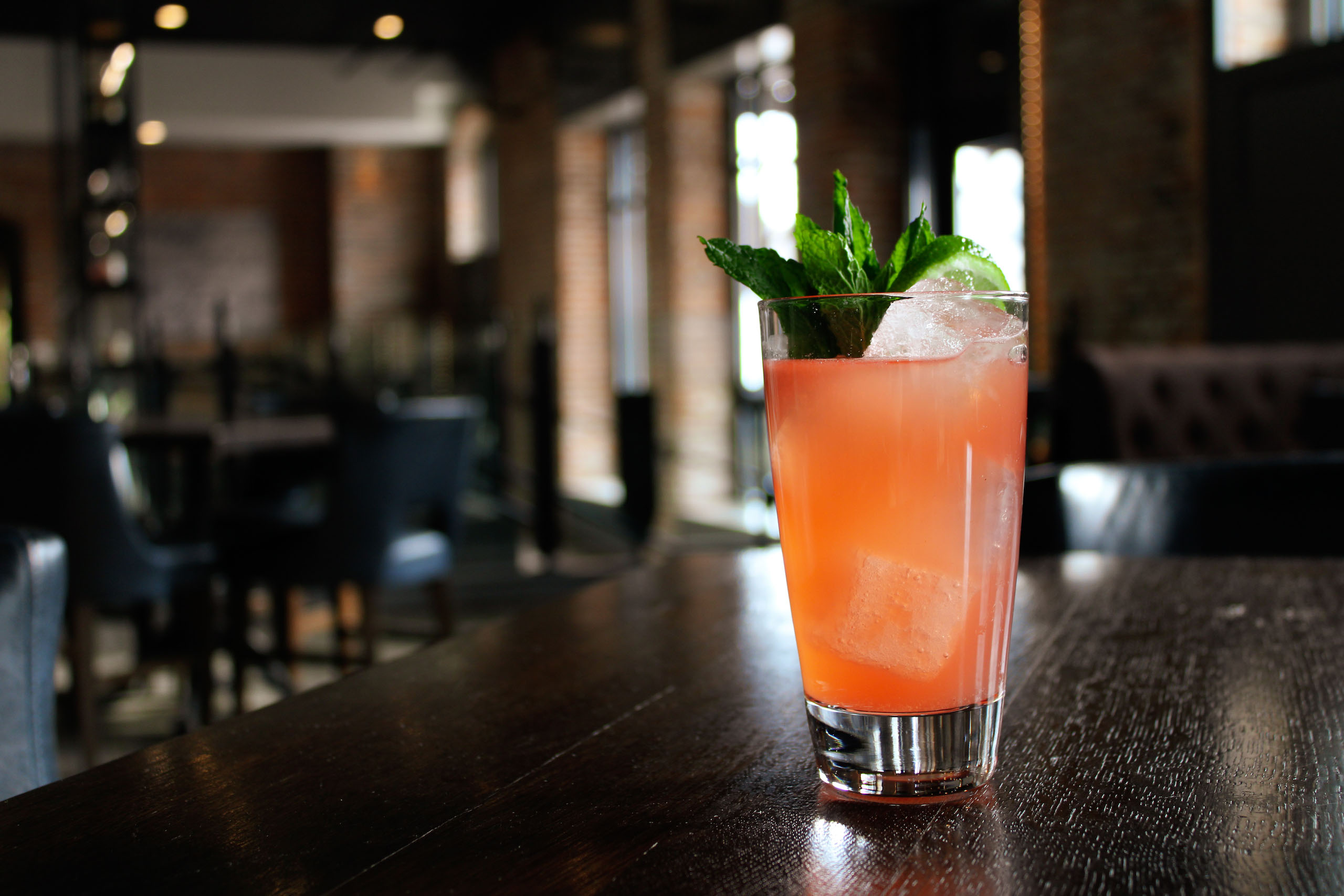 a cocktail sitting on a bar