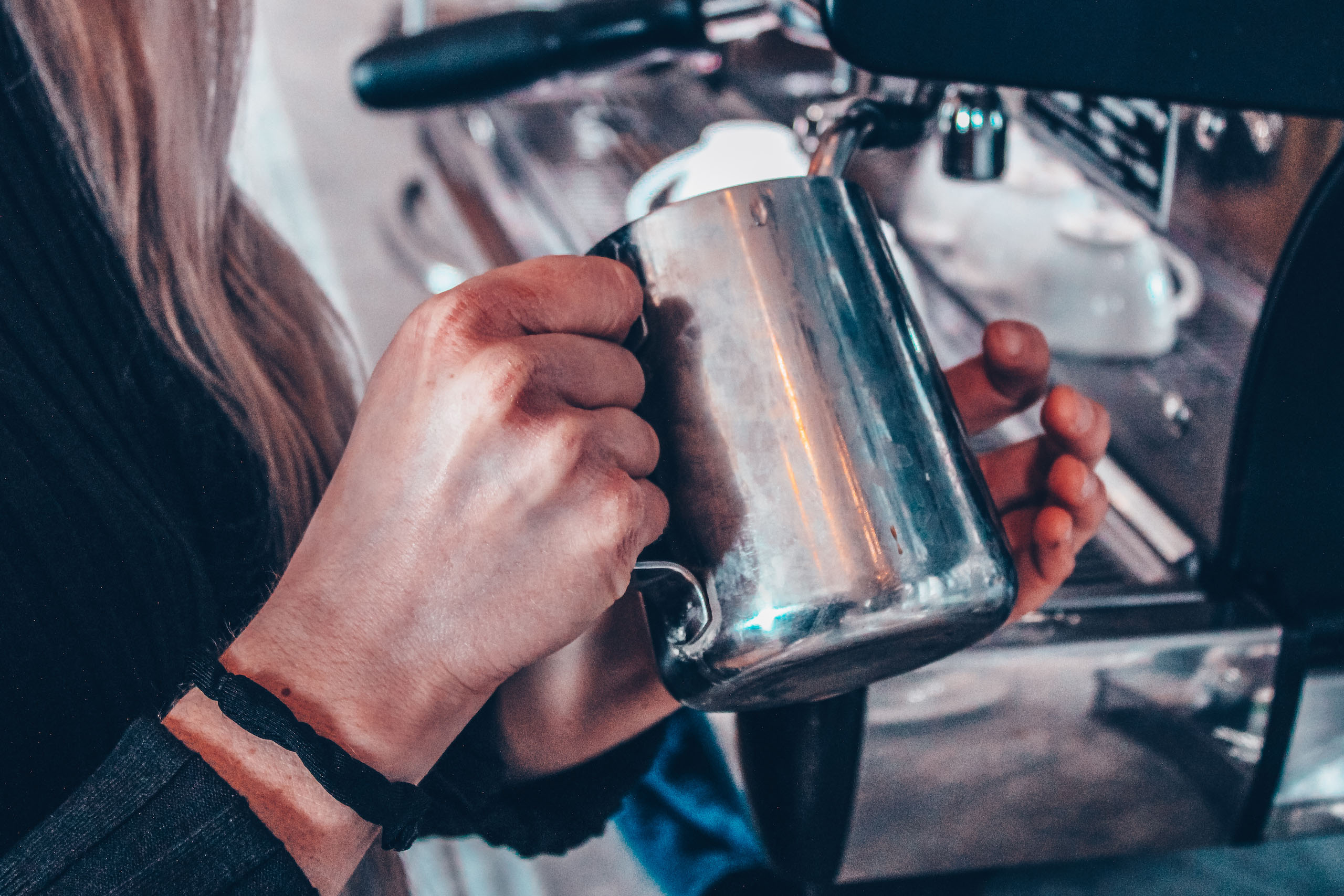 barista steaming milk